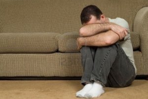 e07ca-4633403-a-sad-man-inside-his-house-crying-into-his-arm